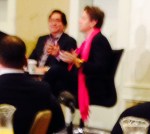 2U CEO, Chip Paucek, stands out in his suit thanks to the brightly colored Pashmina scarves he favors.