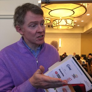 A very approachable Tom Monahan engages with people outside the ballroom after his keynote conversation with Tien Wong.